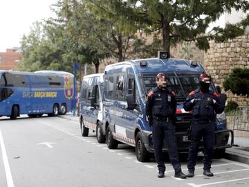 Mossos d'Esquadra, the Catalonia regional police force, keeping a watchful eye as the Barça team bus makes its way to the hotel.