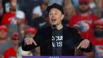 FILE PHOTO: Tesla CEO and X owner Elon Musk speaks during a rally for Republican presidential nominee and former U.S. president Donald Trump, at the site of the July assassination attempt against Trump, in Butler, Pennsylvania, U.S., October 5, 2024. REUTERS/Carlos Barria/File Photo/File Photo