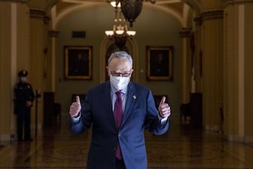 WASHINGTON, DC - MARCH 06: U.S. Senate Majority Leader Sen. Chuck Schumer (D-NY) gives a thumbs up after leaving the senate chamber at the US Captiol on March 06, 2021 in Washington, DC. The Senate passed the latest COVID-19 relief bill by 50 to 49 on a p