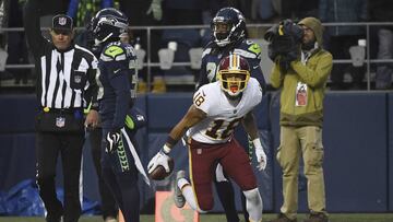 SEATTLE, WA - NOVEMBER 05: Wide receiver Josh Doctson #18 of the Washington Redskins reacts after making a catch near the goal line as defensive back Bradley McDougald #30 and cornerback Shaquill Griffin #26 of the Seattle Seahawks look on during the fourth quarter of the game at CenturyLink Field on November 5, 2017 in Seattle, Washington. The Redskins won 17-14. Steve Dykes/Getty Images/AFP
== FOR NEWSPAPERS, INTERNET, TELCOS & TELEVISION USE ONLY ==