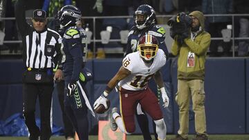 SEATTLE, WA - NOVEMBER 05: Wide receiver Josh Doctson #18 of the Washington Redskins reacts after making a catch near the goal line as defensive back Bradley McDougald #30 and cornerback Shaquill Griffin #26 of the Seattle Seahawks look on during the fourth quarter of the game at CenturyLink Field on November 5, 2017 in Seattle, Washington. The Redskins won 17-14.   Steve Dykes/Getty Images/AFP
 == FOR NEWSPAPERS, INTERNET, TELCOS &amp; TELEVISION USE ONLY ==