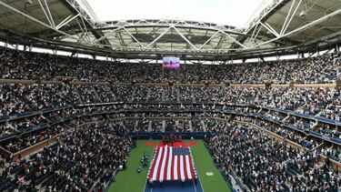 (FILES) In this file photo The US flag is brought to centre court before the start of the 2017 US Open Men's Singles final match between South Africa's Kevin Anderson and Spain's Rafael Nadal at the USTA Billie Jean King National Tennis Center in New York
