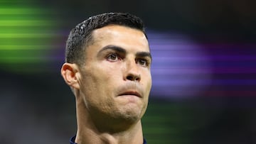 Soccer Football - FIFA World Cup Qatar 2022 - Quarter Final - Morocco v Portugal - Al Thumama Stadium, Doha, Qatar - December 10, 2022 Portugal's Cristiano Ronaldo warms up on the side of the pitch during the match REUTERS/Carl Recine