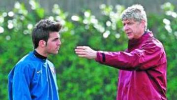 Cesc Fàbregas y Arsene Wenger.