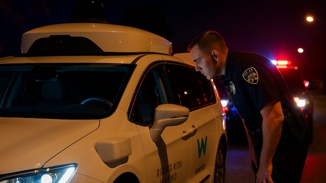 California officers were left baffled after a driverless Waymo car made an illegal turn, sparking a debate over accountability.