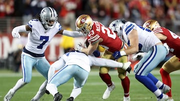 SANTA CLARA, CALIFORNIA - JANUARY 22: Christian McCaffrey #23 of the San Francisco 49ers carries the ball against the Dallas Cowboys during the first half in the NFC Divisional Playoff game at Levi's Stadium on January 22, 2023 in Santa Clara, California.   Lachlan Cunningham/Getty Images/AFP (Photo by Lachlan Cunningham / GETTY IMAGES NORTH AMERICA / Getty Images via AFP)