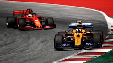 SPIELBERG, AUSTRIA - JUNE 30: Lando Norris of Great Britain driving the (4) McLaren F1 Team MCL34 Renault leads Sebastian Vettel of Germany driving the (5) Scuderia Ferrari SF90 on track during the F1 Grand Prix of Austria at Red Bull Ring on June 30, 2019 in Spielberg, Austria. (Photo by Bryn Lennon/Getty Images)