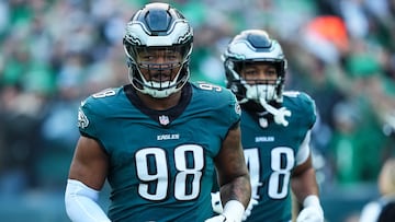 PHILADELPHIA, PA - JANUARY 12: Jalen Carter #98 of the Philadelphia Eagles runs out of the tunnel prior to an NFL football wild card playoff game against the Green Bay Packers at Lincoln Financial Field on January 12, 2025 in Philadelphia, Pennsylvania. (Photo by Cooper Neill/Getty Images)