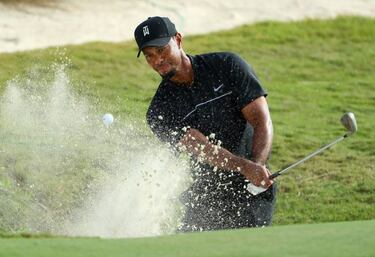 Tiger hits one-over 73 in long-waited return