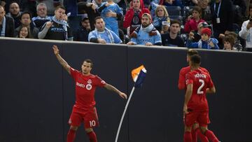 Mar 13, 2016; New York, NY, USA; Toronto FC forward Sebastian Giovinco (10) celebrates a goal against the New York City FC during the second half at Yankee Stadium. Toronto tied New York City, 2-2.