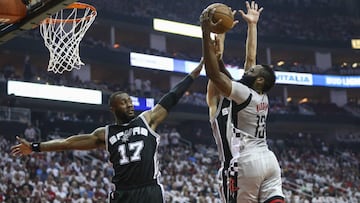 May 7, 2017; Houston, TX, USA; Houston Rockets guard James Harden (13) attempts to score as San Antonio Spurs guard Jonathon Simmons (17) defends during the first quarter in game four of the second round of the 2017 NBA Playoffs at Toyota Center. Mandatory Credit: Troy Taormina-USA TODAY Sports