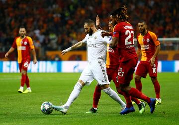 Karim Benzema con Christian Luyindama.