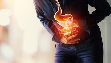 Woman touching stomach painful suffering from stomachache causes of menstruation period, gastric ulcer, appendicitis or gastrointestinal system disease. Healthcare and health insurance concept.