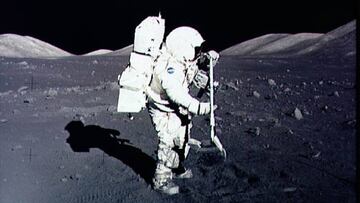 (FILES) In this December 10, 1972, image obtained from NASA, astronaut Harrison Schmitt collects lunar rock samples at the Taurus-Littrow landing site on the moon during the Apollo 17 mission. - NASA on September 10, 2020 announced it was in the market for Moon rocks, and wants to pay companies to scoop out the dirt, take a photo, and then have it ready for collection by a future mission. The contract doesn't actually involve getting to the Moon itself -- a feat only achieved by the national space agencies of three countries -- but instead envisages companies designing a robot that NASA or major private sector players can then launch. (Photo by Handout / NASA / AFP) / RESTRICTED TO EDITORIAL USE - MANDATORY CREDIT "AFP PHOTO / NASA" - NO MARKETING NO ADVERTISING CAMPAIGNS - DISTRIBUTED AS A SERVICE TO CLIENTS