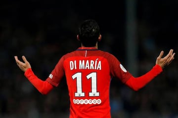 Paris St Germain's Angel Di Maria looks to the heavens as he celebrates one of his two goals.