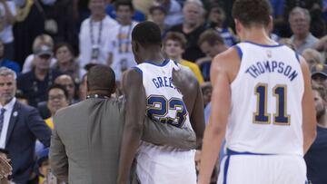 October 27, 2017; Oakland, CA, USA; Golden State Warriors forward Draymond Green (23) is escorted by a team security guard after a fight with Washington Wizards guard Bradley Beal (3, not pictured) during the second quarter at Oracle Arena. Mandatory Credit: Kyle Terada-USA TODAY Sports