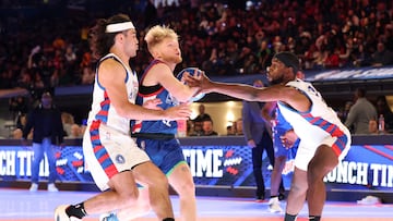 Feb 16, 2024; Indianapolis, IN, USA; Tristan Jass (22) of Team Stephen A shoots against Puka Nacua (17) and Quincy Isaiah (72) of Team Shannon in the first quarter during the All Star Celebrity Game at Lucas Oil Stadium. Mandatory Credit: Trevor Ruszkowski-USA TODAY Sports