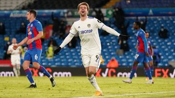 LEEDS, ENGLAND - FEBRUARY 08: Patrick Bamford of Leeds United celebrates after scoring their team&#039;s second goal during the Premier League match between Leeds United and Crystal Palace at Elland Road on February 08, 2021 in Leeds, England. Sporting st