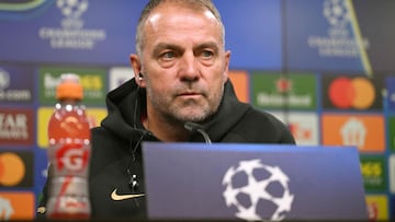 Barcelona's German head coach Hansi Flick addresses a press conference on the eve of the UEFA Champions League quarter-final second-leg football match BVB Borussia Dortmund v FC Barcelona at the Signal Iduna stadium in Dortmund on April 14, 2025. (Photo by Ina FASSBENDER / AFP)