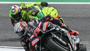 Aprilia Racing's Italian rider Marco Bezzecchi (front) and Pertamina Enduro VR64 Racing's Italian rider Franco Morbidelli ride during the free practice 2 session of the MotoGP Thailand Grand Prix at the Buriram International Circuit in Buriram on February 28, 2026. (Photo by Lillian SUWANRUMPHA / AFP)