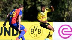 MARBELLA, SPAIN - JANUARY 13: Fabian Frei of FC Basel 1893 and Youssoufa Moukoko of Borussia Dortmund battle for the ball during the friendly match between Borussia Dortmund and FC Basel on January 13, 2023 in Marbella, Spain. (Photo by Harry Langer/DeFodi Images via Getty Images)