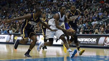 DALLAS, TX - DECEMBER 09: Harrison Barnes #40 of the Dallas Mavericks dribbles the ball against Rodney Stuckey #2 and C.J. Miles #0 of the Indiana Pacers in the second half at American Airlines Center on December 9, 2016 in Dallas, Texas. NOTE TO USER: User expressly acknowledges and agrees that , by downloading and or using this photograph, User is consenting to the terms and conditions of the Getty Images License Agreement. Ronald Martinez/Getty Images/AFP
== FOR NEWSPAPERS, INTERNET, TELCOS & TELEVISION USE ONLY ==