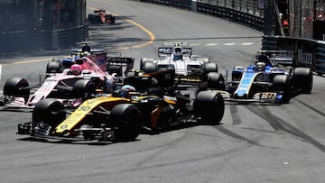 MONTE-CARLO, MONACO - MAY 28: Jolyon Palmer of Great Britain driving the (30) Renault Sport Formula One Team Renault RS17 leads Esteban Ocon of France driving the (31) Sahara Force India F1 Team VJM10, Pascal Wehrlein of Germany driving the (94) Sauber F1 Team Sauber C36 Ferrari and other into the first corner at the start during the Monaco Formula One Grand Prix at Circuit de Monaco on May 28, 2017 in Monte-Carlo, Monaco. (Photo by Mark Thompson/Getty Images)