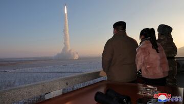 North Korean leader Kim Jong Un views the launch of a Hwasong-18 intercontinental ballistic missile during what North Korea says is a drill at an unknown location December 18, 2023 in this picture released by the Korean Central News Agency. KCNA via REUTERS ATTENTION EDITORS - THIS IMAGE WAS PROVIDED BY A THIRD PARTY. REUTERS IS UNABLE TO INDEPENDENTLY VERIFY THIS IMAGE. NO THIRD PARTY SALES. SOUTH KOREA OUT. NO COMMERCIAL OR EDITORIAL SALES IN SOUTH KOREA. TPX IMAGES OF THE DAY