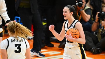 CLEVELAND, OHIO - APRIL 05: Caitlin Clark #22 of the Iowa Hawkeyes reacts after beating the UConn Huskies during the NCAA Women's Basketball Tournament Final Four semifinal game at Rocket Mortgage Fieldhouse on April 05, 2024 in Cleveland, Ohio. Iowa defeated Connecticut 71-69   Jason Miller/Getty Images/AFP (Photo by Jason Miller / GETTY IMAGES NORTH AMERICA / Getty Images via AFP)
