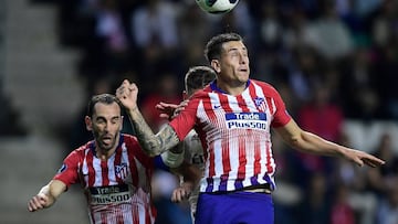 Godín y Giménez.
