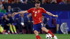 Spain's midfielder #08 Fabian Ruiz kicks the ball during the UEFA Euro 2024 Group B football match between Spain and Italy at the Arena AufSchalke in Gelsenkirchen on June 20, 2024. (Photo by KENZO TRIBOUILLARD / AFP)