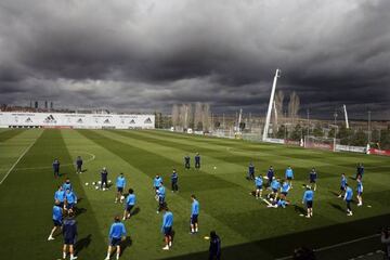 Real Madrid train under some dark clouds in Valdebebas ahead of their Champions League tie with Wolfsburg.