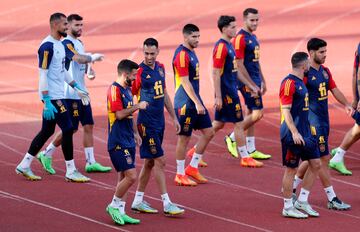 José Luis Gayá con Sergio Busquets y Dani Carvajal con Marco Asensio.