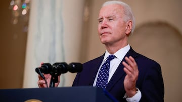 FILE PHOTO: U.S. President Joe Biden speaks in the Cross Hall at the White House in Washington, U.S., April 20, 2021. REUTERS/Tom Brenner/File Photo