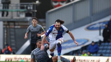 BLACKBURN, ENGLAND - JANUARY 01: Blackburn Rovers' Ben Brereton Diaz is tackled by Cardiff City's Andy Rinomhota
during the Sky Bet Championship between Blackburn Rovers and Cardiff City at Ewood Park on January 1, 2023 in Blackburn, United Kingdom. (Photo by Lee Parker - CameraSport via Getty Images)