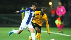 Soccer Football - Europa League - Group G - BSC Young Boys v FC Porto - Stade de Suisse, Bern, Switzerland - November 28, 2019  Young Boys&#039; Moumi Ngamaleu in action with FC Porto&#039;s Otavio  REUTERS/Denis Balibouse