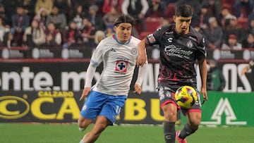 Cruz Azul's forward #18 Luka Romero and Tijuana's midfielder #10 Kevin Casta�eda fight for the ball during the Liga MX Clausura football match between Tijuana and Cruz Azul at Caliente stadium in Tijuana, Baja California state, Mexico on January 31, 2025. (Photo by Guillermo Arias / AFP)