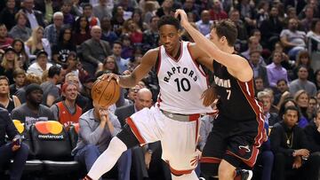 Nov 4, 2016; Toronto, Ontario, CAN; Toronto Raptors guard DeMar DeRozan (10) dribbles the ball past Miami Heat guard Goran Dragic (7) in the fourth quarter at Air Canada Centre. Mandatory Credit: Dan Hamilton-USA TODAY Sports