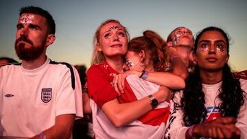 LONDON, ENGLAND  - JULY 11: England football fans react after their defeat as they watch the Hyde Park screening of the FIFA 2018 World Cup semi-final match between Croatia and England on July 11, 2018 in London, United Kingdom.The winner of this evening&