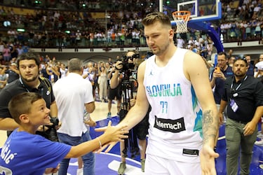 Luka Doncic back on court as Slovenia beat Italy