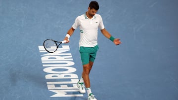 Tennis - Australian Open - Melbourne Park, Melbourne, Australia, February 14, 2021 Serbia&#039;s Novak Djokovic reacts during his fourth round match against Canada&#039;s Milos Raonic REUTERS/Loren Elliott