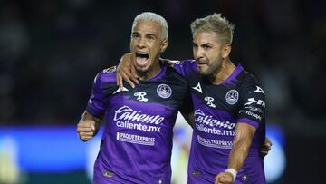 MAZATLAN, MEXICO - SEPTEMBER 18: Camilo Sanvezzo and Jorge Z&aacute;rate celebrates the first goal of Mazatlan during the 9th round match between Mazatlan FC and Pumas UNAM as part of the Torneo Grita Mexico A21 Liga MX at Kraken Stadium on September 18, 