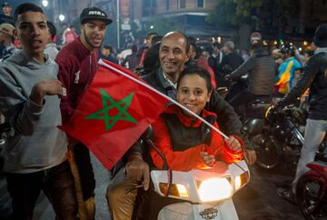 Locals celebrate in Marrakech after Morocco's victory over Ivory Coast in their FIFA 2018 World Cup Play-Off.