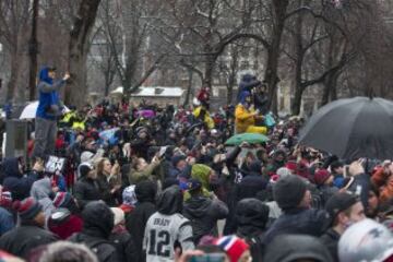 Los aficionados durante el desfile de la victoria de los Patriots.