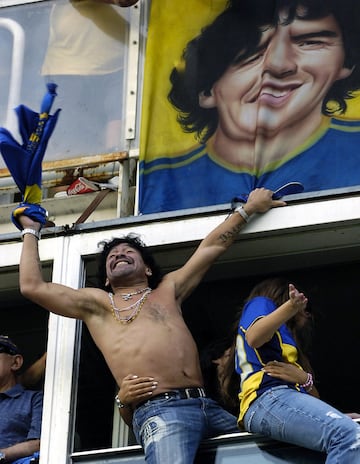 Diego Armando Maradona supporting Boca Juniors at La Bombonera.