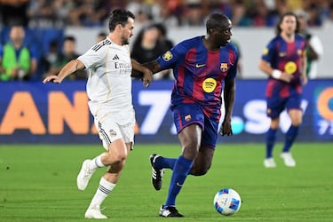 Savio Bortolini y Yaya Touré.