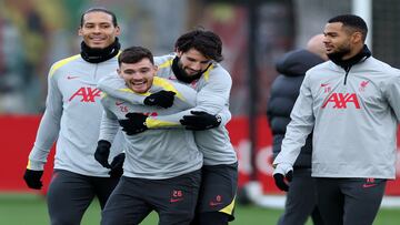 Soccer Football - Champions League - Liverpool Training - AXA Training Centre, Liverpool, Britain - December 9, 2024 Liverpool's Virgil van Dijk, Andrew Robertson, Dominik Szoboszlai and Cody Gakpo during training REUTERS/Phil Noble