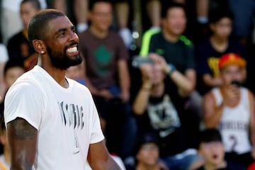NBA player Kyrie Irving of the Cleveland Cavaliers reacts during a promotional event in Taipei, Taiwan