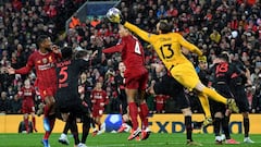 Atletico Madrid&#039;s Slovenian goalkeeper Jan Oblak punches the ball clear during the UEFA Champions league Round of 16 second leg football match between Liverpool and Atletico Madrid at Anfield in Liverpool, north west England on March 11, 2020.