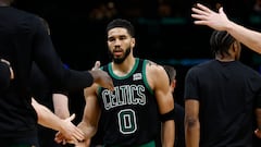 May 1, 2024; Boston, Massachusetts, USA; Boston Celtics forward Jayson Tatum (0) is congratulated by teammates during a timeout during the third quarter of game five of the first round of the 2024 NBA playoffs against the Miami Heat at TD Garden. Mandatory Credit: Winslow Townson-USA TODAY Sports